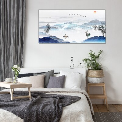 A peaceful mountain landscape with a deer Glass art print