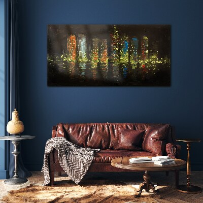 The city at night in the glow of lights Glass art print