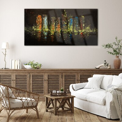 The city at night in the glow of lights Glass art print