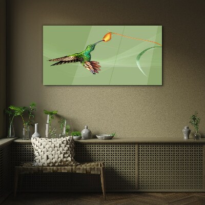 Hummingbird at a flower Glass art print