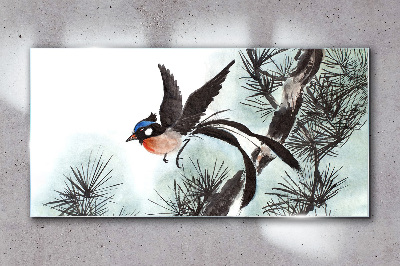 A bird in flight over the pines Wall art on glass