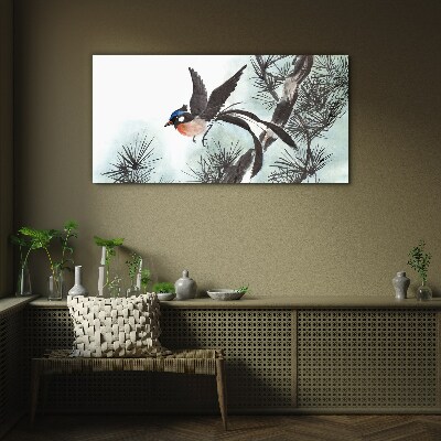 A bird in flight over the pines Wall art on glass
