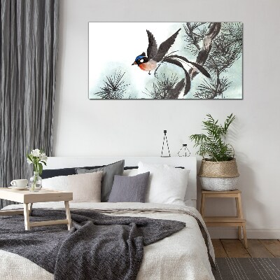 A bird in flight over the pines Wall art on glass