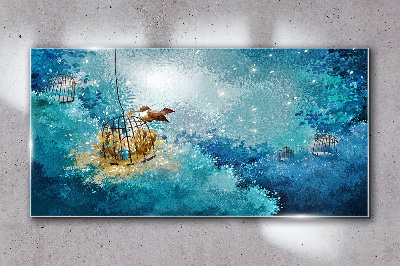 A caged bird against the sky Glass art print