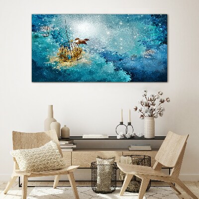 A caged bird against the sky Glass art print