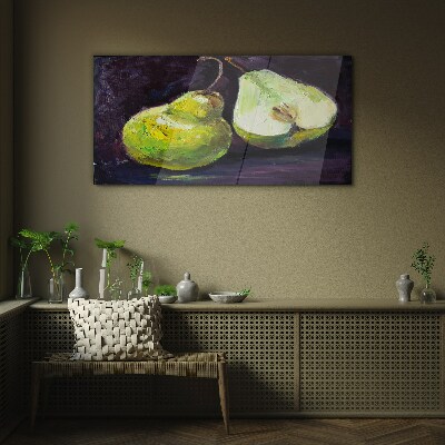 Green pears on a dark background Glass art print