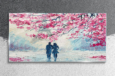 A spring walk under the blooming trees Glass art print