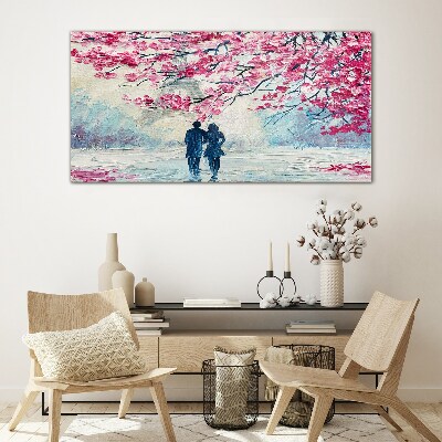 A spring walk under the blooming trees Glass art print