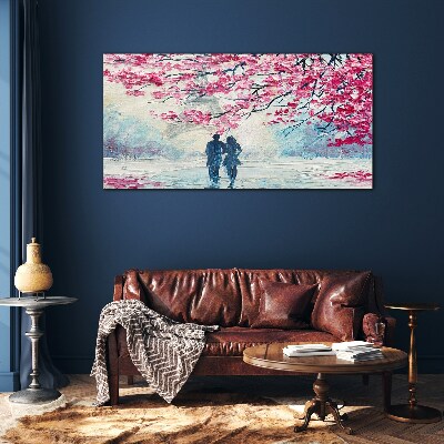 A spring walk under the blooming trees Glass art print