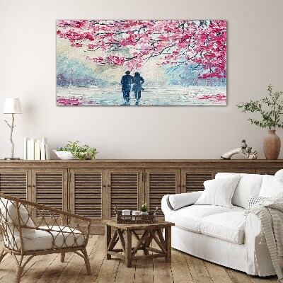 A spring walk under the blooming trees Glass art print