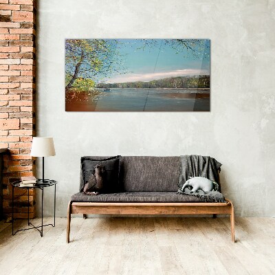 A peaceful landscape by the river Glass art print