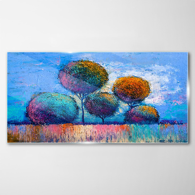 Colorful trees on a blue background Glass art print