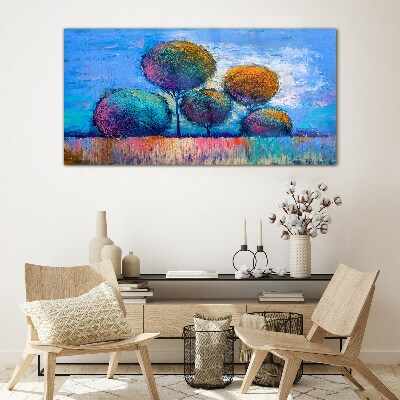 Colorful trees on a blue background Glass art print