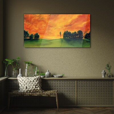Sunset over the green hill Wall art on glass