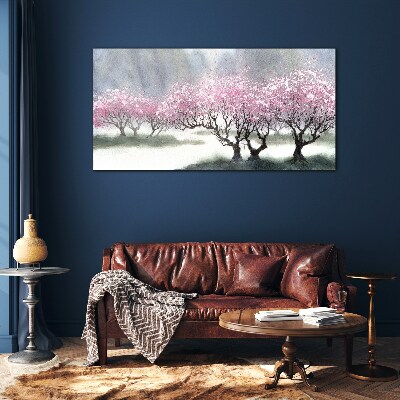 Blossoming trees in the spring haze Glass art print
