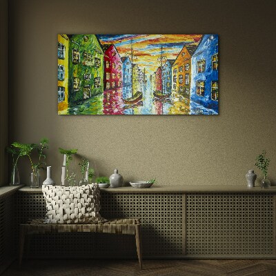 Colorful townhouses by the river Glass art print