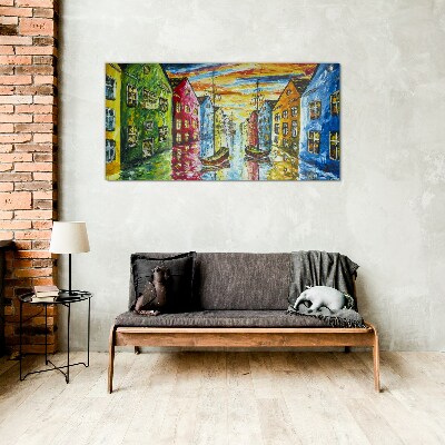 Colorful townhouses by the river Glass art print