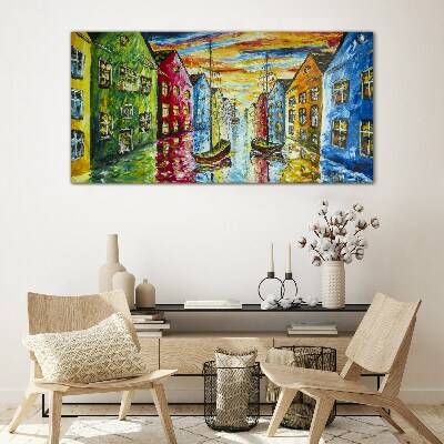 Colorful townhouses by the river Glass art print