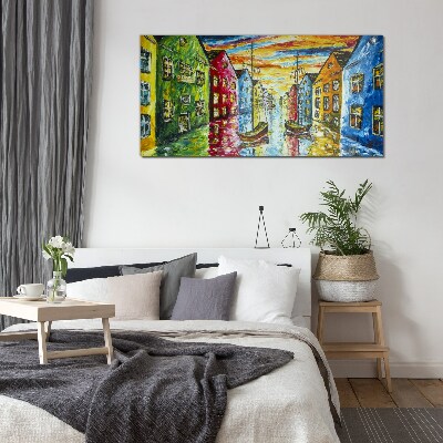 Colorful townhouses by the river Glass art print