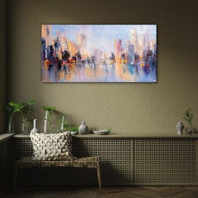 The city in the glow of sunset Wall art on glass