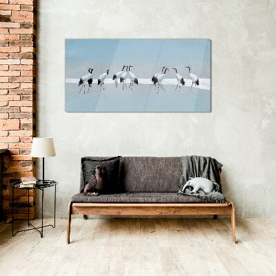 Flocks of cranes on a blue background Glass art print