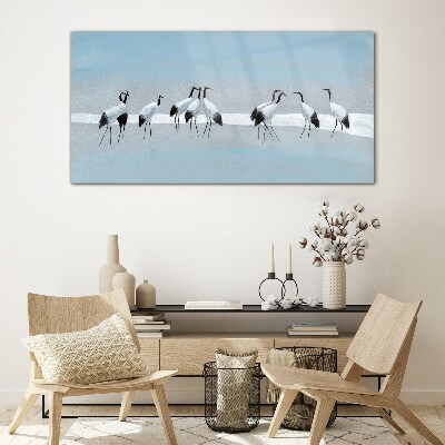 Flocks of cranes on a blue background Glass art print