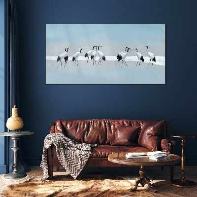 Flocks of cranes on a blue background Glass art print