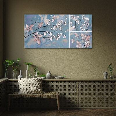 Floral branches on a blue background Glass art print