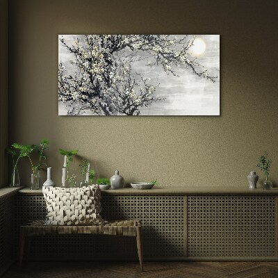 A blooming branch in a monochromatic tone Wall art on glass