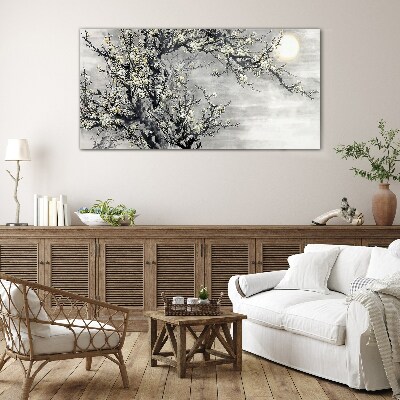 A blooming branch in a monochromatic tone Wall art on glass