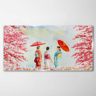A spring walk under the blooming trees Glass art print