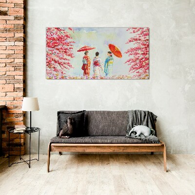 A spring walk under the blooming trees Glass art print
