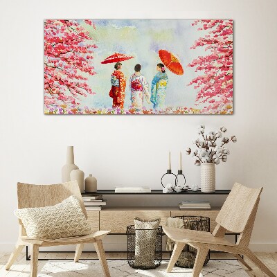A spring walk under the blooming trees Glass art print