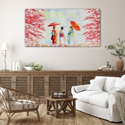 A spring walk under the blooming trees Glass art print