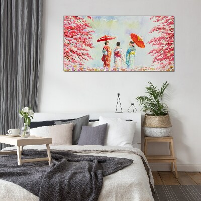 A spring walk under the blooming trees Glass art print