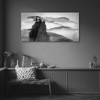 A lonely tree on a rocky mountain Glass art print