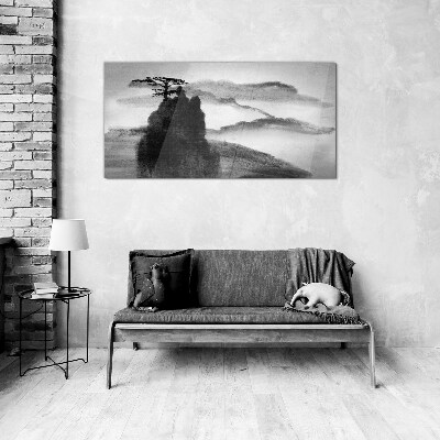 A lonely tree on a rocky mountain Glass art print
