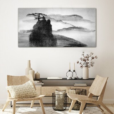 A lonely tree on a rocky mountain Glass art print