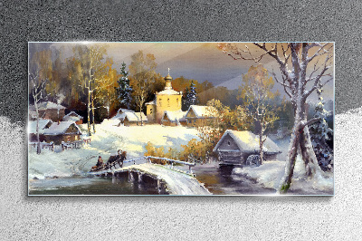 Winter landscape with a village church Glass art print
