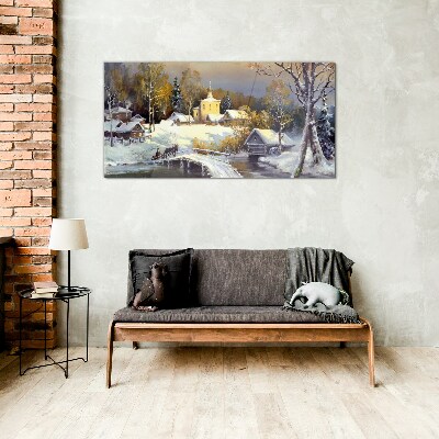 Winter landscape with a village church Glass art print