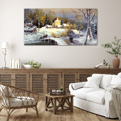 Winter landscape with a village church Glass art print