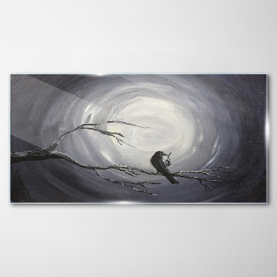 A lonely bird on a branch Wall art on glass