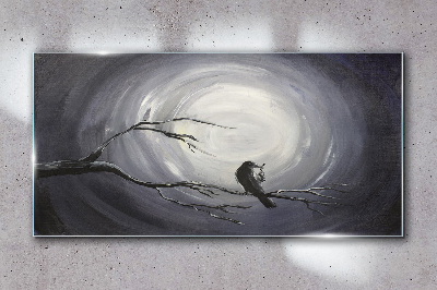 A lonely bird on a branch Wall art on glass