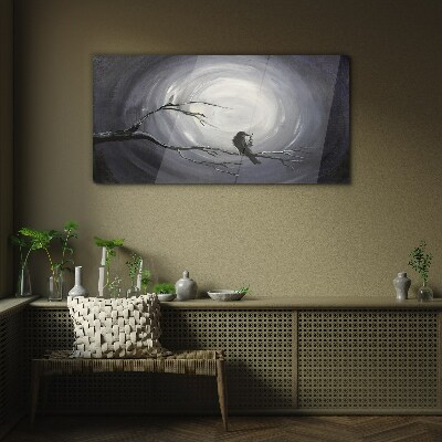 A lonely bird on a branch Wall art on glass