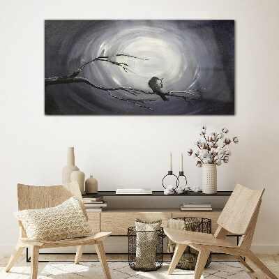 A lonely bird on a branch Wall art on glass