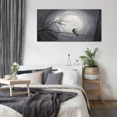 A lonely bird on a branch Wall art on glass