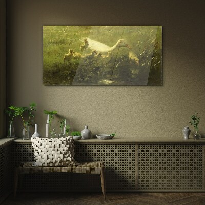 Duck with chicks in the grass Glass art print