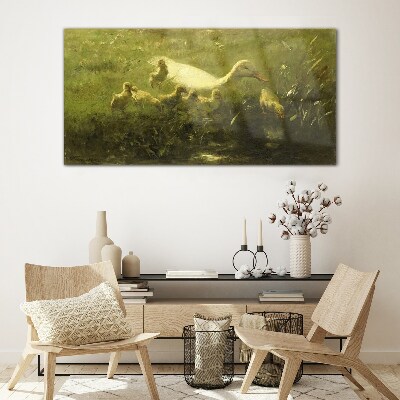 Duck with chicks in the grass Glass art print