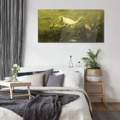 Duck with chicks in the grass Glass art print
