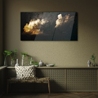 Golden clouds on a dark background Wall art on glass